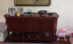 $1450 OBO
Dining room table and buffet mahagony set from William sonoma that I purchased from WSHome in 2010. Purchase price: $3450 table, $3250 Buffet.
The buffet is in near perfect condition and offers a significant amount of storage, the dining room