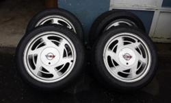 Size 185/65R14-85S
4 winter tires on rims so easy, lower cost tire change for winter driving.
Stored in clean garage. 1997 & 1998: May fit newer Civics and other cars--check size.
