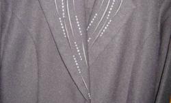 Woman's black pantsuit with silver decoration on lapels. See picture. New.