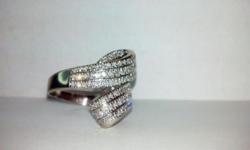 WOMANS ELEGANT DIAMOND RING!!WHITE TAG SALE!!%50 OFF!!
White Gold Ring Size 11 1/2
1ct in Diamonds
6.1Dwt White Gold
Suggested retail price : $1600.00
Our Price : $800.00
This is only one of many pieces of jewelry we have for sale.
Come visit us at 9306