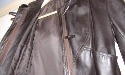 Amazing Womens Leather trech coat. Worn a couple of times. MINT CONDITION!!
Fully lined. With wais band and hood. There is a hidden zipper. Very charming coat!
Size XS / 0
Colour: Chocolate brown.
Tags were removed.
Actual Measurements (lying flat):