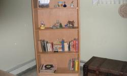 Selling used bookcase in good condition. Light wood colored. Pick up only. Asking $30 OBO.
