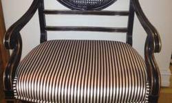 Set of two striped, silk upholstered wooden chairs; wood is carved and lacquered gold in areas.
Chairs originally purchased by CURRENT owner; hand-carved wood.
Email with further questions. Two chairs available to be purchased as a set.