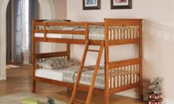 79L x 42 W x 63 H
This twin over twin bunk bed will make a practical addition to your home. Full length guard rails offer safety, while the coordinating ladder will conveniently lead you to the top twin bunk. Clean lines and the pine solids and veneer