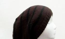 A beautiful warm wool slouchy beanie hat. The colors are dark brown (taupe brown) with black stripes and is made with a soft pure wool yarn. This oversized hat, will be a great addition to your accessories. Worn by men and women. Knitted with pure wool