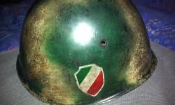 Available to the ardent World War II collector, is an Italian Army helmet, without a liner, that was used by the soldiers who refused to surrender to the Allies. They then joined the SS to continue their fight. The helmet has no rust or dings, just shows