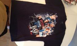 Official WWE Merchandise
Brand New With Tags
Pictured on shirt is Randy Orton, John Cena, Shamus, Dolph Ziggler
Get it now, before it's gone!