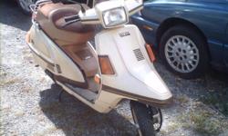 This is a great running Yamaha Scooter.
It has a 4 stroke 180cc air cooled gasoline engine.
I just put in a new battery. It's 72 inches long and weighs 269 pounds.
All the lights works except for the dash lights.
I'm selling it cheap because it has no
