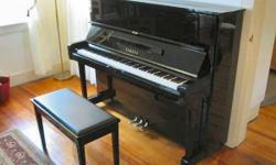 Hi polish ebony finish with matching bench excellent sound and condition tined delivery available