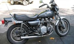 1980 KZ 1000 LTD B. The bike is not currently running (dead battery). I'm not a mechanic but I believe that the cam chain is loose and one cylinder fouls the plug. The bike is not original it has been modified. Has new bars and grips. Tires, chain,