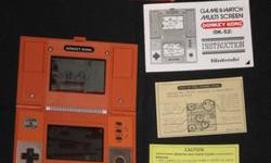 Vintage 1982 Nintendo Donkey Kong Game & Watch Multiscreen, DK-52; Everything is original including: game, box, inner polystyrene tray, instruction booklet & all paperwork. Outer case has a few minor scratches. Lines in second picture are from reflections
