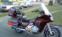 This is my Classic 1984 Gold Wing Interstate. I purchased this bike brand new from the showroom floor back in 1984. It has 17, 950 original miles and the color is Wineberry. This bike has always been garaged and covered . Every time I washed this bike, I