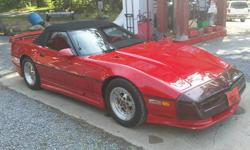 1987 Corvette Red Convertible
? 16,500 miles; museum quality
? Always since day one, stored/covered in heated facility; has never seen wet weather!
? L98 350 cid/400hp engine with factory installed Carroll Supercharging system, stage one water/alcohol