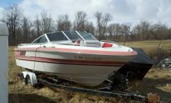 1987 sea ray seville twenty one foot with ez loader tandem axle trailer. Needs motor rebuilt. Nice boat just lost intrest in it. Has a nice ez loader tandem axle trailer under it.