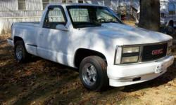 Hi, i have a 1990 gmc stepside white in color with a small block chevy motor which was rebuilt with a mild cam, new carb, heaters, new manifold, new rims and tires and i just put in a crome water pump.
It also has a three inch scoop on hood. The interior