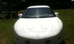 I have a 95 white trans am for sale. It has a 5.7 litre V-8. It runs great and is very fast, it was raced against a 07 dodge charger and won.the inspection doesn't expire until 03/2015. I also just put in a new fly wheel and starter. The car sounds
