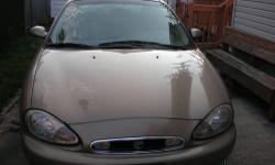 1999 Mercury Sable, 207k. Automatic, 4 Door, Tan color with Daytime Running Lghts, Sunroof, ABS, power leather seats, power windows, power mirrors and locks. AM/FM Radio with CD Changer Excellent Condition, Clear Title: Asking $1,700 negotiable . Contact