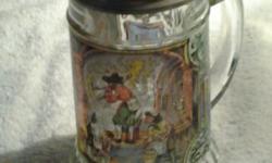 WEST GERMANY PEWTER LID GLASS BEER STEIN
PRICE: 40.00
-------------------------------------------------------------------
TREASURE CRAFT MIRAGE 48 OZ PITCHER - 40.00
------------------------------------------------------------------------------------