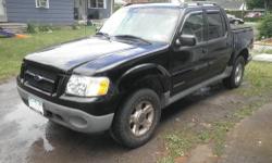 I have a 2001 Ford Explorer Sport Trac. This truck is still driven weekly although I bought a bigger truck. has a 4.5' bed with 4 doors. Has the 4.0 SOHC engine with the 5 speed manual M5OD transmission. 4wd drive works great. Had new brakes all the way
