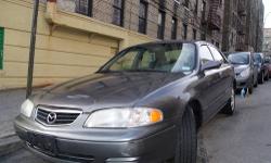 Up for sale 2001 Mazda 626 ES especial package. With only 91k miles. Clean title this Mazda is super clean it looks, drives and operates in perfect Condition. This car was kept very, very clean inside and outside. No leaks, no problems and just passed