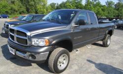 Up for your consideration this just in 2003 Dodge Ram 2500 SLT Crew Cab four by four with very rare 8 ft box, and even rarer V10 magnum FI engine with 5 speed manual transmission and floor mounted shift on the fly four wheel drive.... Fully loaded with