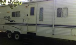 Selling our 30 foot travel trailer with slide out and bunks sleeps 8. We will include the weight distribution hitch also and we pulled this trailer with a 1/2 ton pick-up. Everything works great and it is clean. Lots of storage and very nice layout, has a