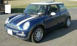 2004 Mini Cooper This sporty car has 87,000 miles and is in great condition while currently being driven at the time 1.6 liter inline 4 cylinder automatic with a 5 speed manual transmission Single overhead cam SOHC drivetrain with 16 valves EPA mileage