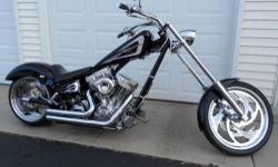 2004 PitBoss Chopper Super SideWinder
Black with Silver/Purple Graphics
S & S 1584cc Engine
6 Speed Left Side Drive
Frame: Daytech
Vance & Hines Short Shots Exhaust
Rake: 40 in the neck 3 in the trees
Front Tire: 21x2.15
Rear Tire: 18x8.5
Lepara Seat