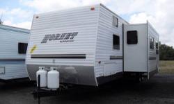 This camper is huge!!! Its 36ft long with one slide out that opens up the living area very nice. It has two bedrooms, one in the front with a queen bed and in the back a smaller bedroom with two bunks and a table/booths. This camper is in nice condition,