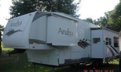 Unique 2005 StarCraft Aruba 5th Camper, One of a Kind!!! Excellent Condition, Inside and Out! Inside is bright and reminds you of being on the Caribbean! Some features include: Vinyl Floors, Carpet, Top/Bottom Fridge, Shower w/ Glass Door, Tow Package,