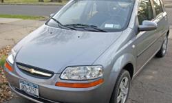 2006 charcoal grey Chevy Aveo 5 speed manual hatchback with 4 cylinder 1.6L engine in good working condition with only 27,000 miles with like new tires replaced at 22,000. Rated at 26 MPG city and 35 MPG highway. Tinted front window, radio, 4 speakers,