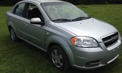 2007 Chevy AVEO LS DOES HAVE REBUILT TITLE DUE TO VERY LIGHT HIT WHICH HAS BEEN REPAIRED four cylinder automatic with only 72K runs and drives excellent ice cold AC aux plug in on radio dual airbags daytime running lights remote start just inspected new