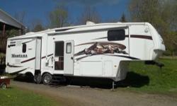 Arctic Package, 3 Slide Outs With Toppers, This 5Th Wheel Is In Excellent Condition & Everything Works Like New! Has Hook Ups For Satellite Dish And Power Awnings. Original Owner, Smoke Free.
INTERIOR FEATURES: Vinyl Floors, Carpet, Oak Cabinets, Corian
