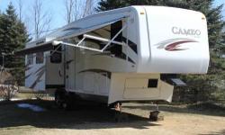 2010 Camper - Cameo Made By Carriage - 35'
This 35' Cameo Luxury Fifth Wheel camper has been made available by Carriage. Carriage has been building the worlds finest luxury campers since 1968.
This Fifth Wheel Cameo was custom built in 2010 to be a fully
