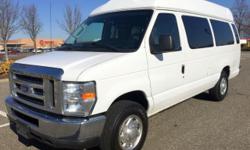 New Style 2010 Ford Wheelchair Ambulette Shuttle Bus / Van converted by Mobility Works with a electronic rear wheelchair lift. The van is equipped with the reliable and fuel efficient 5.4L gas engine with only 77,032 miles and runs as new at highway
