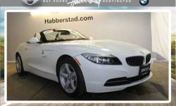 This Convertible generally a pleasure to drive. Options on this vehicle include a Retractable Headlight Washers Through-Loading System W/integrated Transport Bag Heated Front Seats Storage Pkg Cold Weather Pkg -inc: Heated Steering Wheel, a Kansas Leather