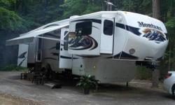 TAKE A LOOK AT THIS LIKE NEW CONDITION 2011 KEYSTONE MONTANA HICKORY MODEL 3750FL FIFTH WHEEL TRAILER!!!
TOP OF THE LINE, HICKORY EDITION AND MOVING TO MONTANA PACKAGE!!!!
NON-SMOKING & LESS THAN 500 TOWING MILES
FEATURES INCLUDE: 5 SLIDE OUTS, PUSH