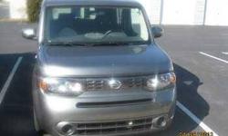 2011 Nissan Cube This sedan currently has 14,200 miles and it is still in great condition Exterior color is gray and with a black cloth interior Equipped with a 4 cylinder automatic transmission 4 door sedan with a rear hinged door Power steering and