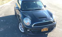 2012 Mini Cooper S.
Exterior color is Black, interior is black leather with factory installed toffee color trim option. This car is in excellent condition inside and out, with barely a single dent or scratch. I am the original owner of the car, having