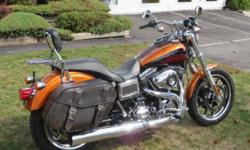 WE SOLD IT NEW IN APRIL, HE TRADED IN FOR A CVO! FACTORY WARRANTY GOOD TO 4/30/2016. COMES WITH HARLEY SADDLEBAGS, SISSY BAR AND LUGGAGE RACK.
The new Harley-DavidsonÂ® DynaÂ® Low RiderÂ® motorcycle is an easy-handling, street custom motorcycle with a low