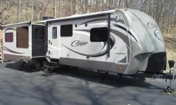 2014 Keystone Cougar 321res, New never used retail price: over $50,000.00, for additional pictures see new dealer sites. Packages included: High Country Package, TT Convenience Package, Camping in Style Package, Polar Plus Package, 50amp service,