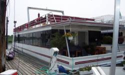 2001 Catamaran Houseboat. Water front living in NYC area for less than a tiny apartment. Great live aboard layout. Like having a waterfront condo with 2 bedrooms, 2 baths, large living area and full size kitchen, washer/dryer combo stack, baseboard