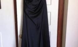 Black, strapless, floor length gown that laces up in back. You can remove the modesty piece in the back to show more skin if you want, or leave it in. Brand new with tags still on! 100% polyester, 100% nylon netting. Was purchased for a wedding but the