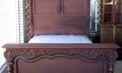 This is an antique turn of the last century Victorian style full-size bed frame. It is in very good to excellent condition. The head-board dis-assembles in two sections for transport. Beautiful applique carving detail and color with old world charm. A