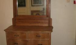 Oak mirror and dresser combination. Available as a set or individually. Call John at 914-946-7030 .