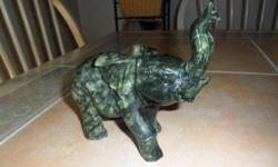 Antique Elephant Dark Green Jade Statue-This Exceptional Antique, Beautiful Dark Green Multi color Jade Elephant carving, comes from China. This Antique would make a great item to add to your collection, especially if you?re a Elephant collector. Elephant