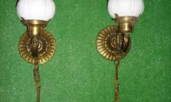 Pair of unique, elegant vintage/antique sconces, 14 inches high, electrified, Victorian style finely detailed bronze with cameo glass globes. Use with or without decorative bronze chain. Original wiring, needs replacement. Sconces and globes are in
