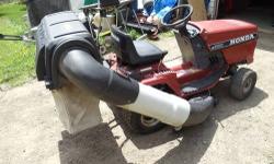 HERES A REAR BAGGER FOR A HONDA 3810 RIDING MOWER(may fit others too?)ITS IN GREAT SHAPE,DUSTY/DIRTY BUT SOLID..ON/OFF IN MINUTES(really!).(THIS IS JUST THE BAGGER,**NOT** THE TRACTOR!).PLEASE CALL 607-729-0347 BETWEEN 8 & 8.