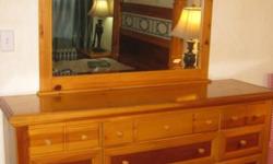 Very well made bedroom set by Vaughan-Bassett. Its about 15 years old, but in very good condition. Plenty of storage too. We're selling it only because we'd like a change. Priced to sell.
Long dresser, 39"H x 64"W x 18"D
Mirror, 45"H x 45"W
Armoire, 68"H