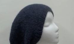 The color of this large slouch hat is a dark blue called ?blueberry?. Large oversized slouchy. The yarn is textured and fuzzy and soft, not heavy. The composition of this yarn is 75% acrylic and 25% alpaca. Great soft yarn. The measurements of this hat